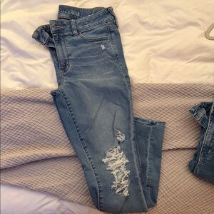 American Eagle Outfitters Women's Light Blue Ripped Skinny Jeans